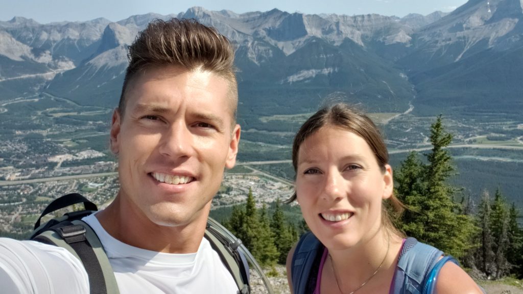 Selfie of Stephen Wagner and Elisha Comeau standing on Grotto Mountain