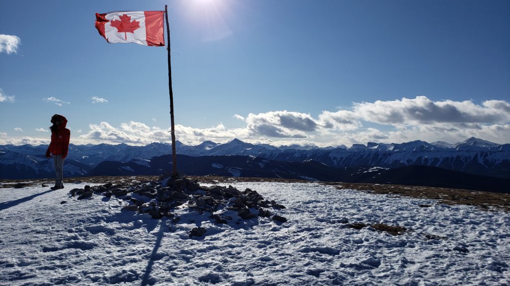 Picture of the beautiful and breathtaking Summit at Prairie Mountain. Including a Canadian Flag.