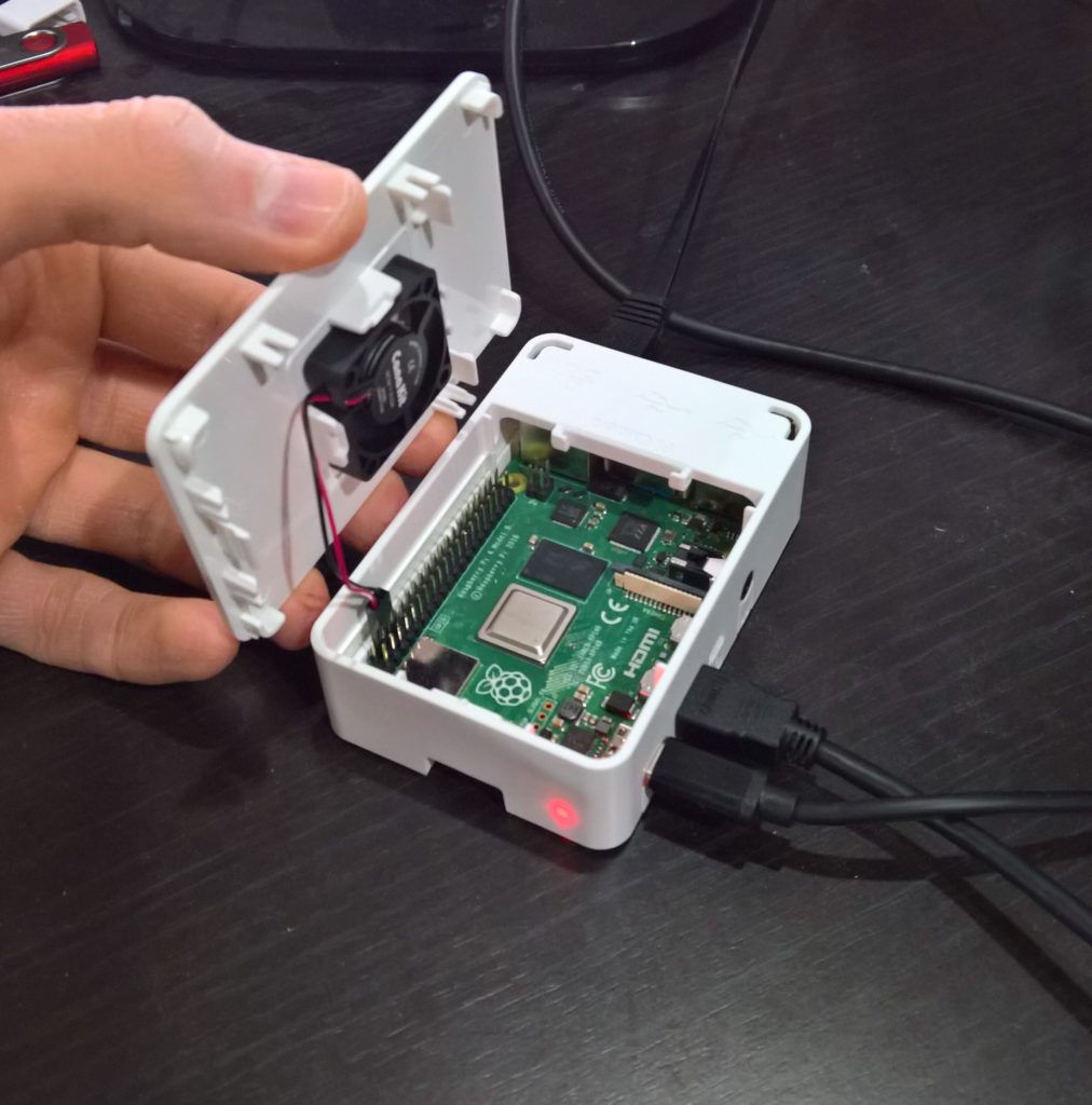 CanaKit Raspberry Pi 4 case open with Fan Kit and running