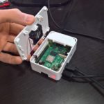 CanaKit Raspberry Pi 4 case open with Fan Kit and running