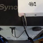 Picture of a Raspberry Pi 4 UART connected to a console port on a Synology Disktation 1813+